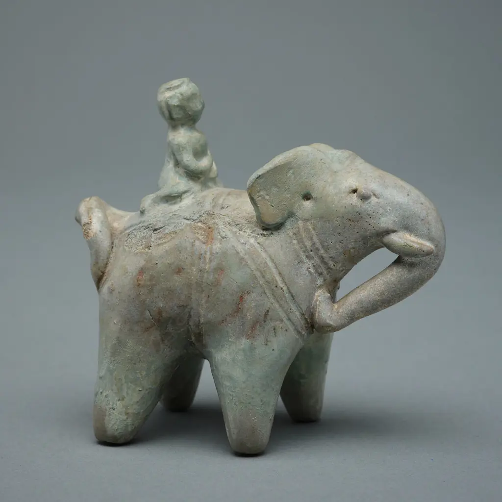 A Sawankhalok stoneware figure, Image 1++